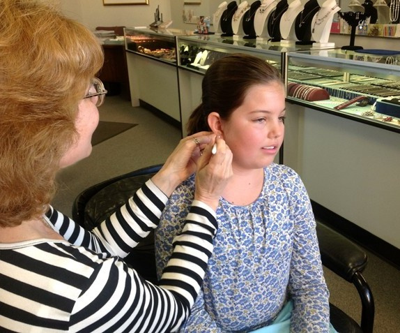 Janet Rothstein drawing dots before piercing